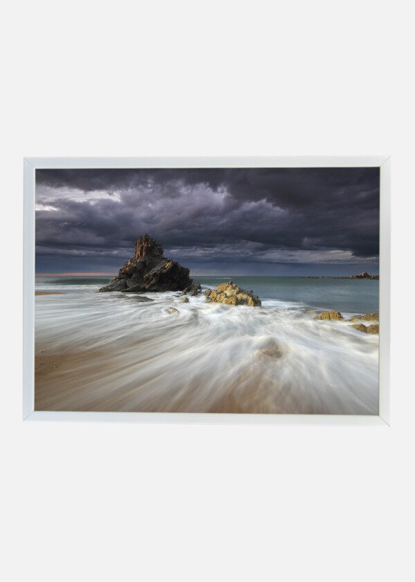 WAVES AGAINST BEACH