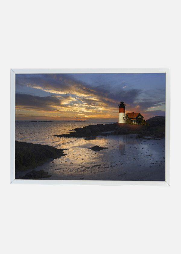 LIGHTHOUSE IN EVENING LIGHT