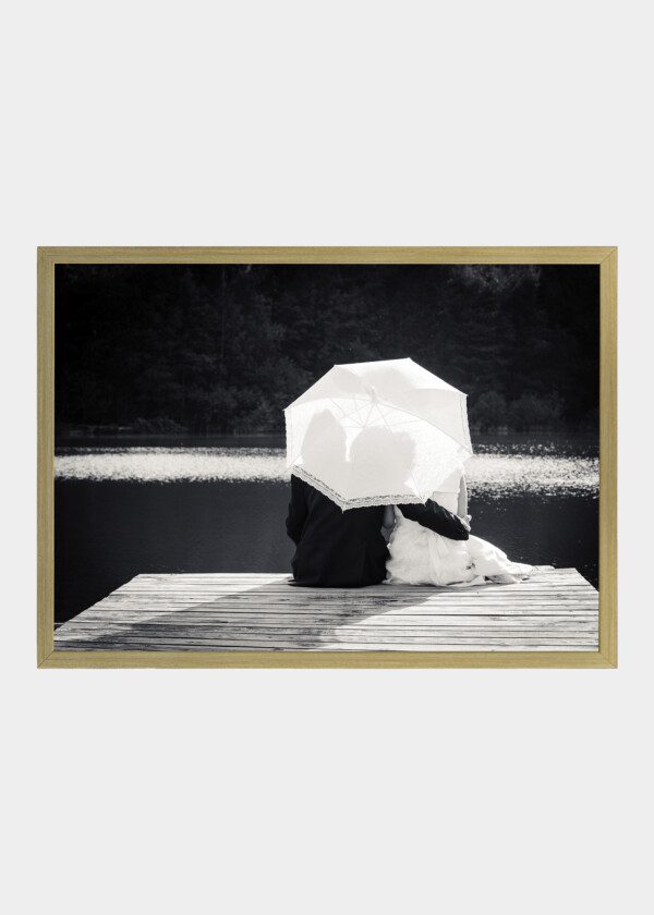 UNDER PARASOL ON THE PIER EDGE