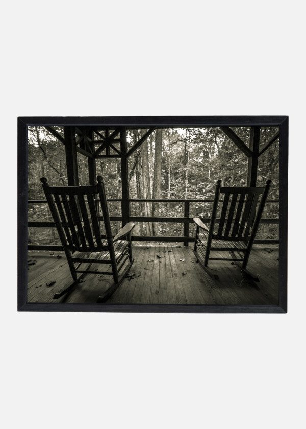 TWO EMPTY ROCKING CHAIRS