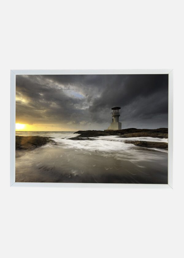 LIGHTHOUSE UNDER DARK SKY