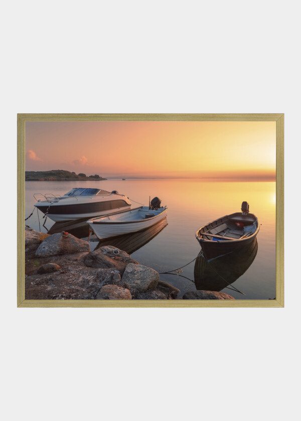 THREE BOATS AT SUNSET