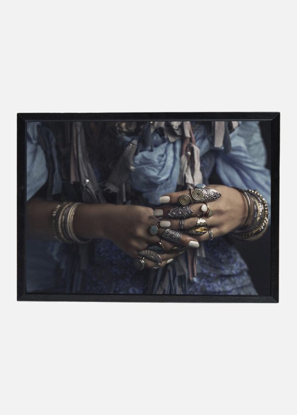GYPSY STYLE YOUNG WOMAN WEARING TRIBAL JEWELLERY CLOSE UP
