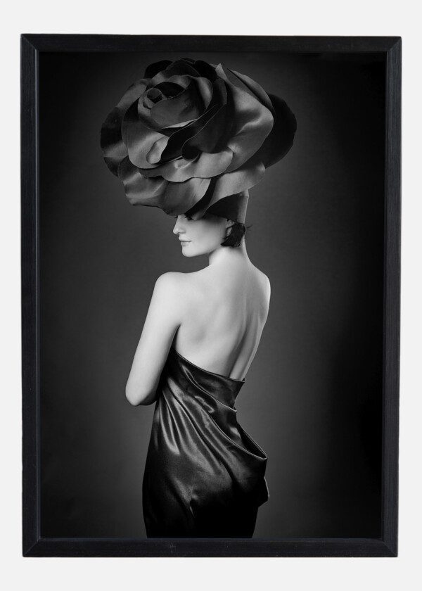 BLACK AND WHITE PORTRAIT OF A GIRL IN A DARK ROSES SUIT