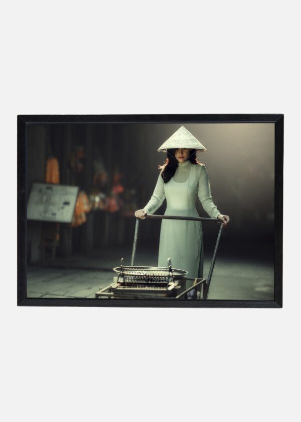 ASIAN WOMAN PUSHING FOOD CART