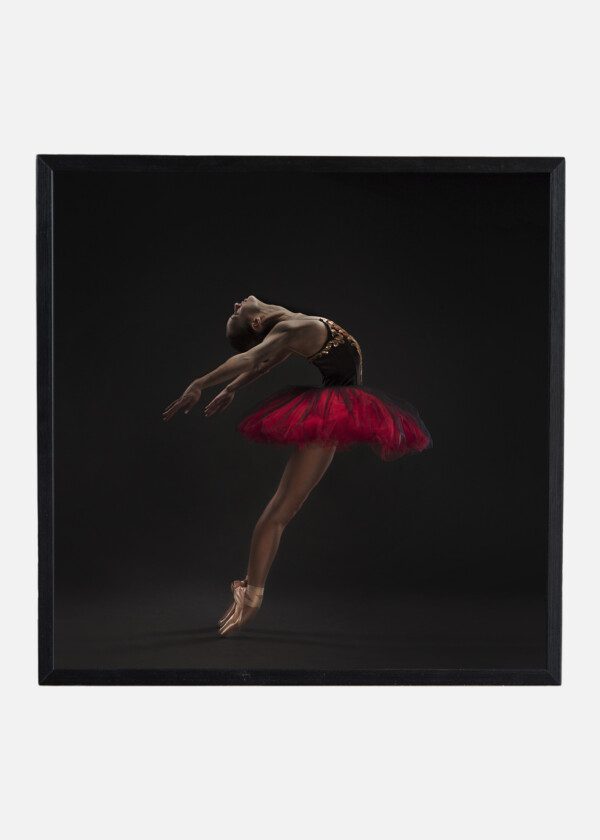 BEAUTIFUL WOMAN BALLET DANCER ISOLATED ON STUDIO BLACK BACKGROUND