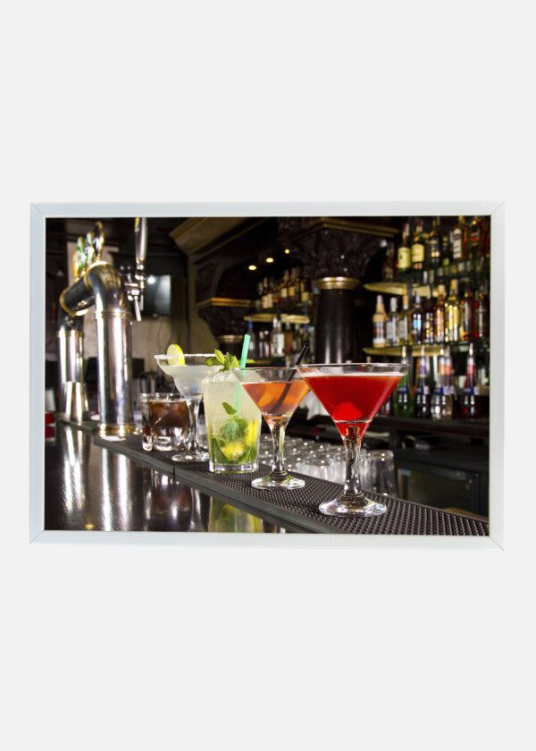 FIVE COCKTAILS ON THE BAR COUNTER