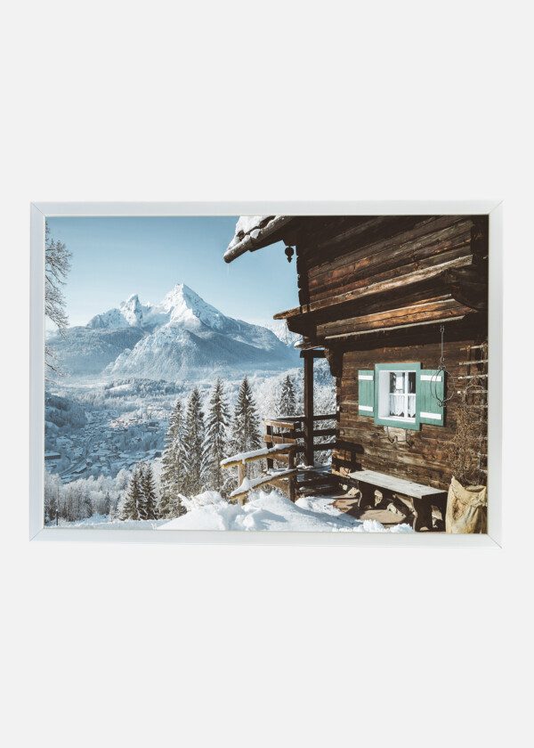 TRADITIONAL WOODEN MOUNTAIN CABIN IN SCENIC WHITE WINTER WONDERLAND