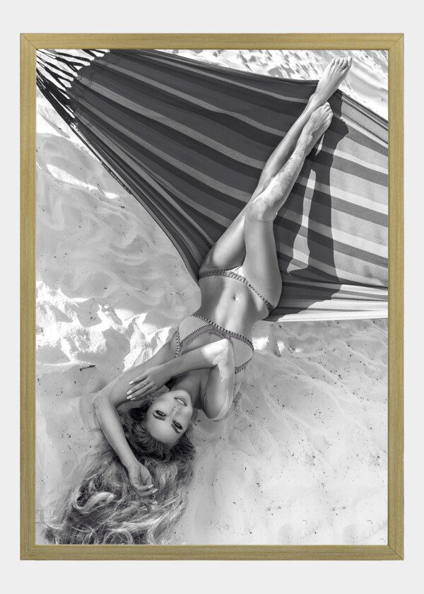 SEXY GIRL SITTING ON HAMMOCK