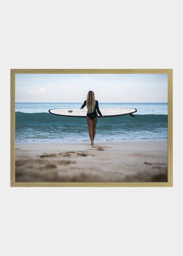 BEAUTIFUL SURFER GIRL IN BLACK BODYSUIT WITH LONG BLOND HAIR