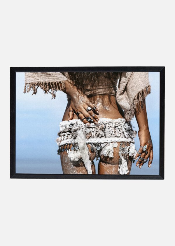 CLOSE UP OF YOUNG FASHIONABLE STYLISH WOMAN BUTTOCKS WITH TANNED SKIN WEARING STYLISH BOHO ACCESSORIES