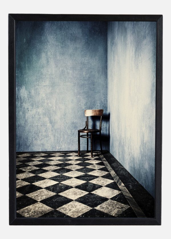 GRUNGE ROOM WITH BLUE OLD WALLS TILED FLOOR AND WOODEN CHAIR IN CORNER